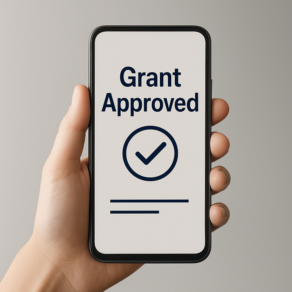 alt=LLRA Grant Approved Phone and Hand